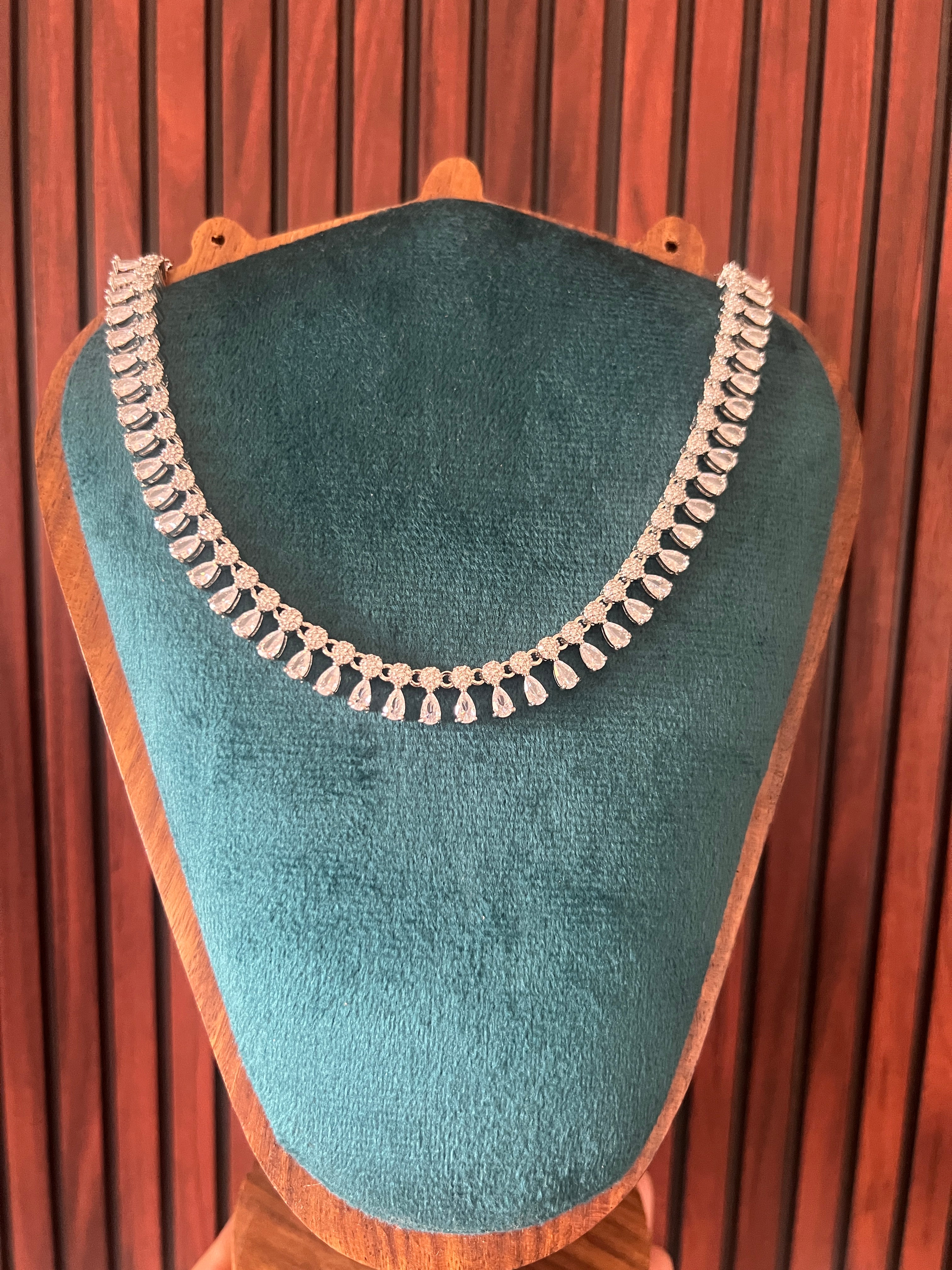 Elegant Diamond Jewelry On Velvet Stand